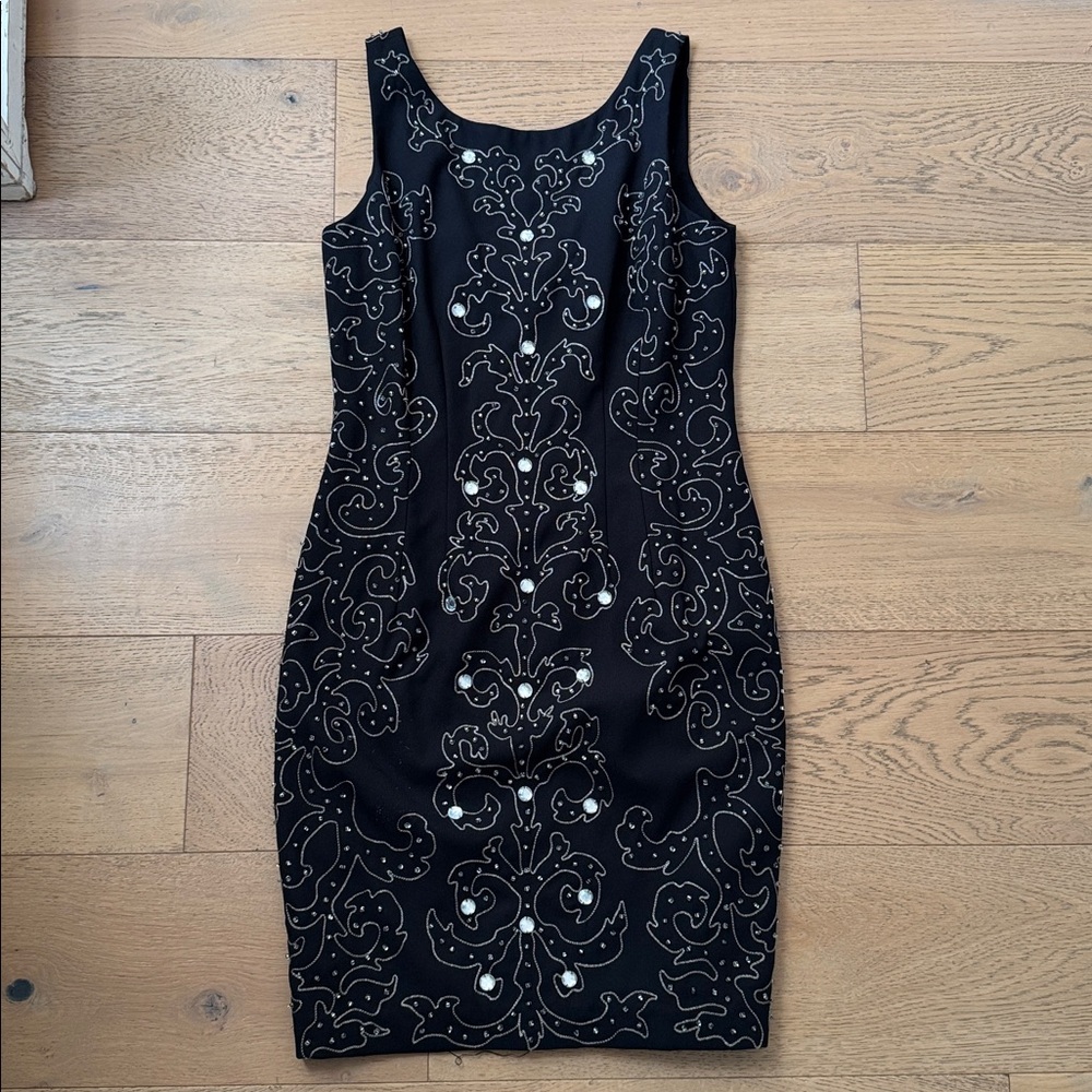 vintage A.J. Bari black cocktail mini dress featuring ornate silver embroidery.